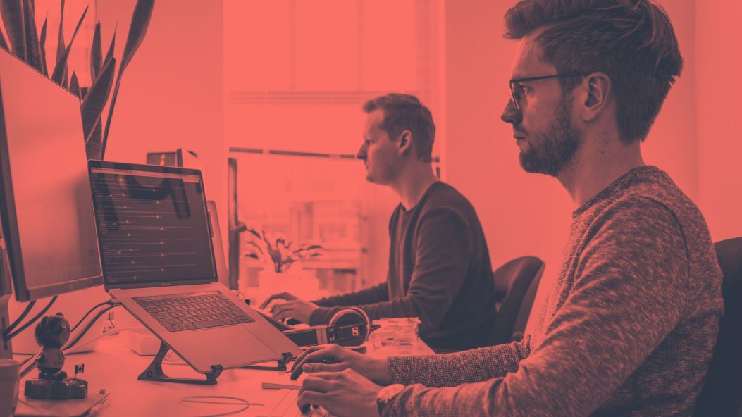 Storesome Men Looking at Screen